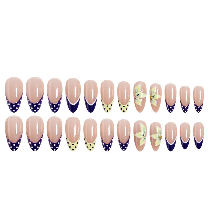 Artful nail tips with floral accent Bowlift