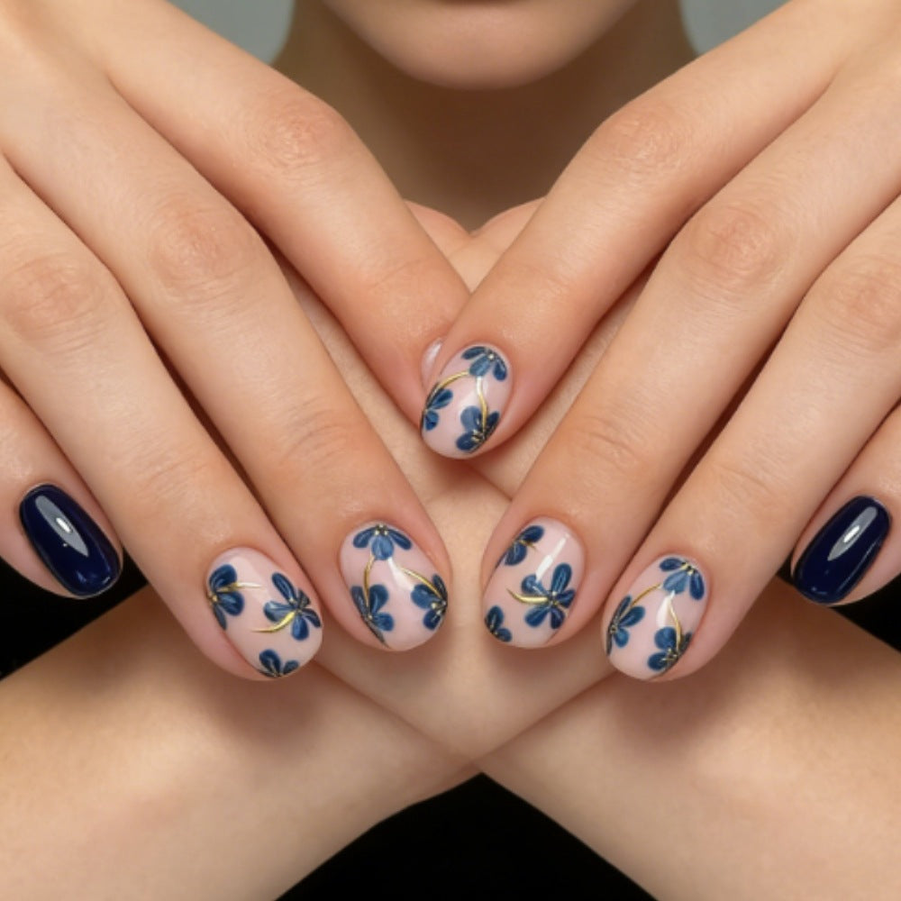 Artificial nails set with floral designs and shine finish Bowlift