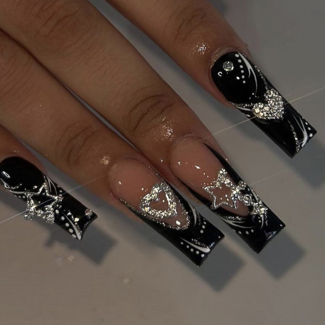 Artistic Long Press-On Nail Design with Rhinestone Accents Bowlift