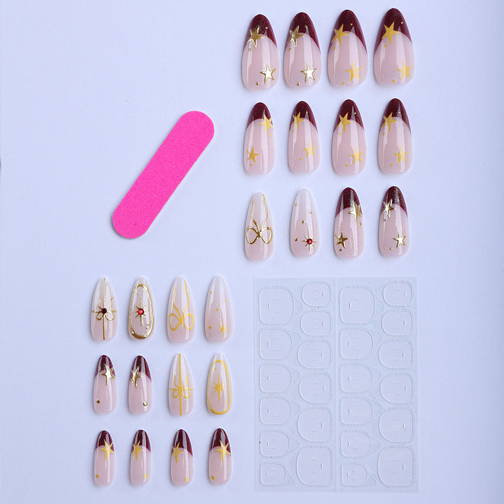 Luxury artificial fingernails with glamorous embellishments Bowlift