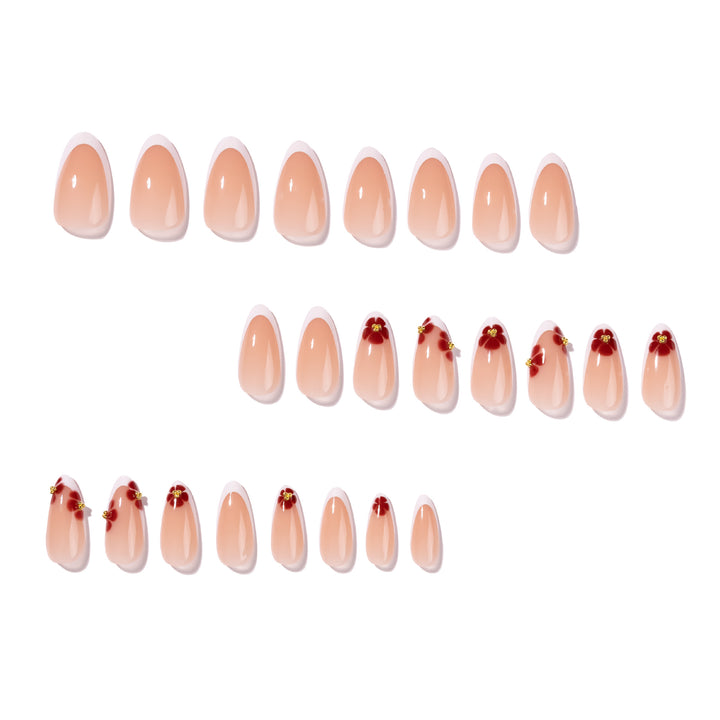 Artistic stiletto nails with luxurious floral design Bowlift