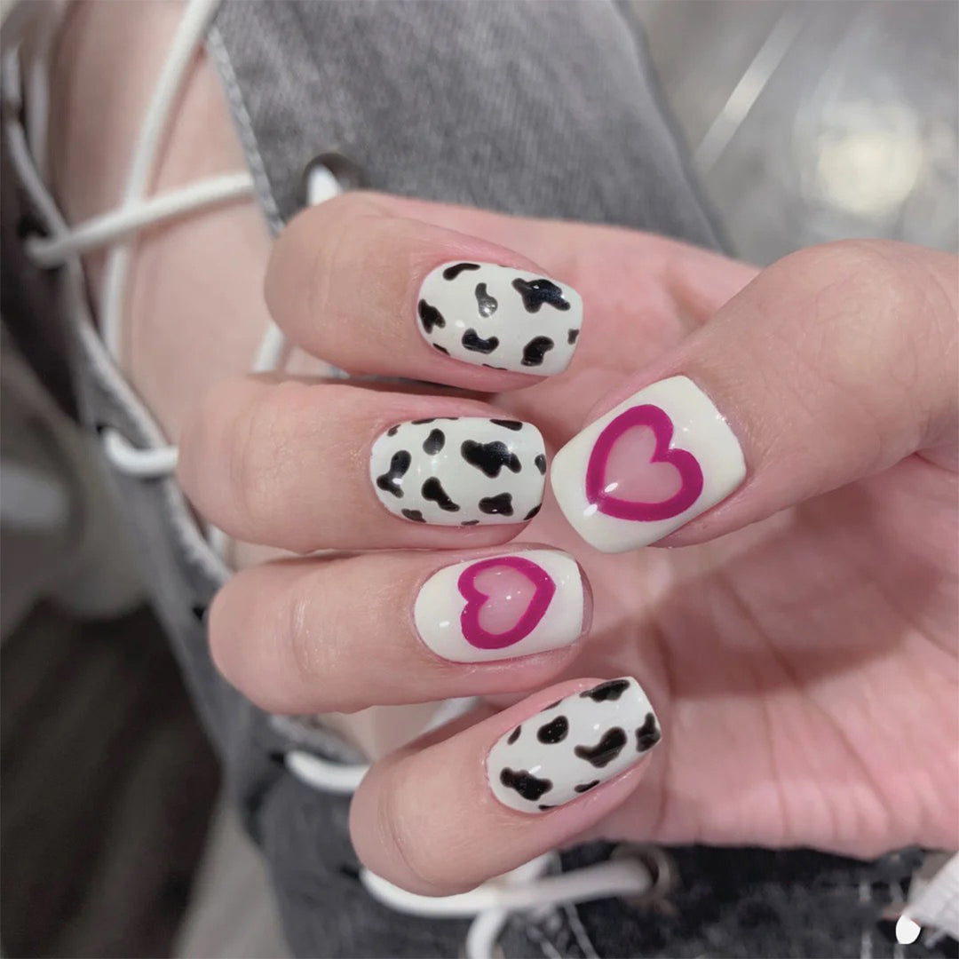 Creative nail art with heart and animal pattern motif Bowlift