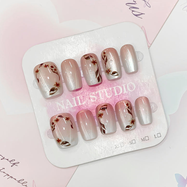 Artistic nail tips with floral accents Bowlift