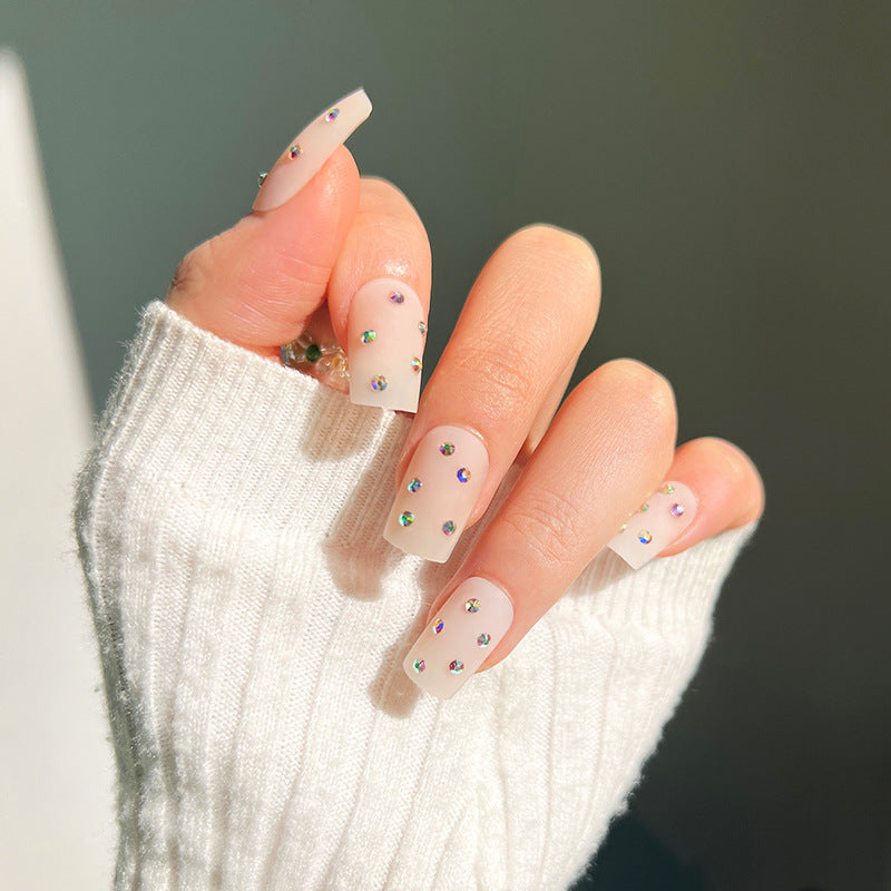 Artistic nail art with elegant rhinestone embellishments Bowlift