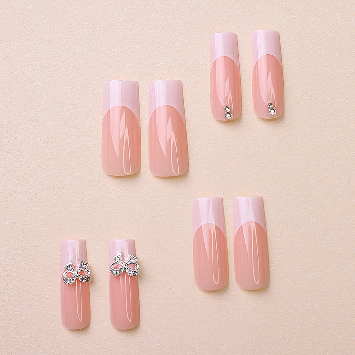 Artificial nails with rhinestone details Bowlift