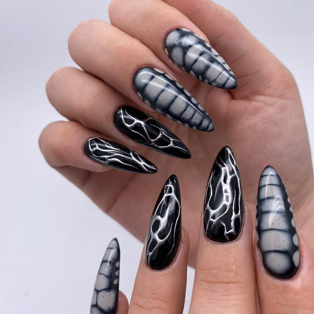 Artistic stiletto nails with modern structure design Bowlift