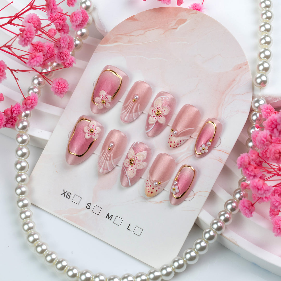 Nail set with floral design and elegant accents Bowlift