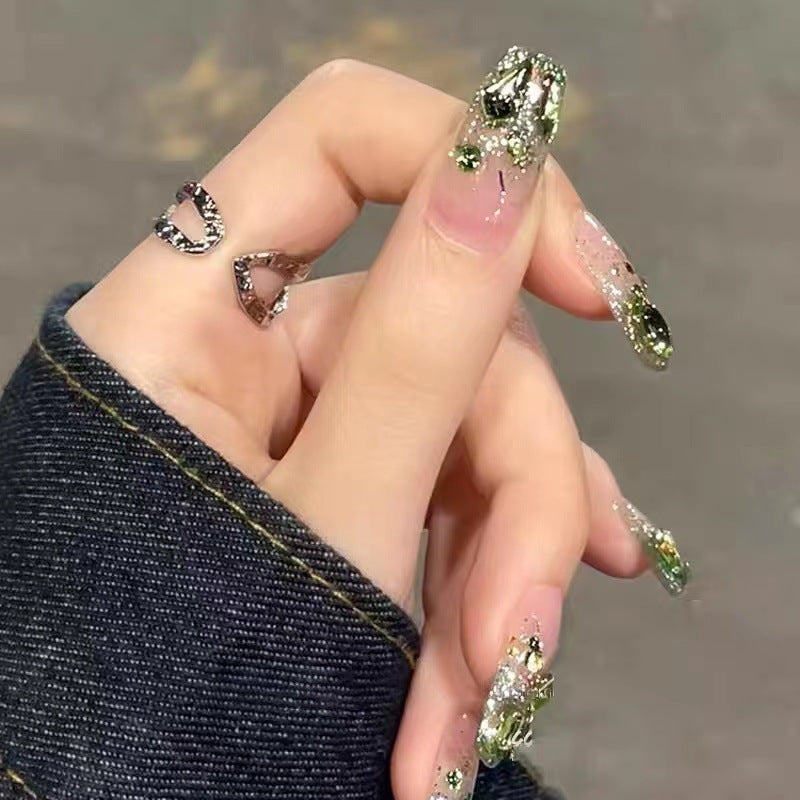 Glittering artificial nails in modern design Bowlift