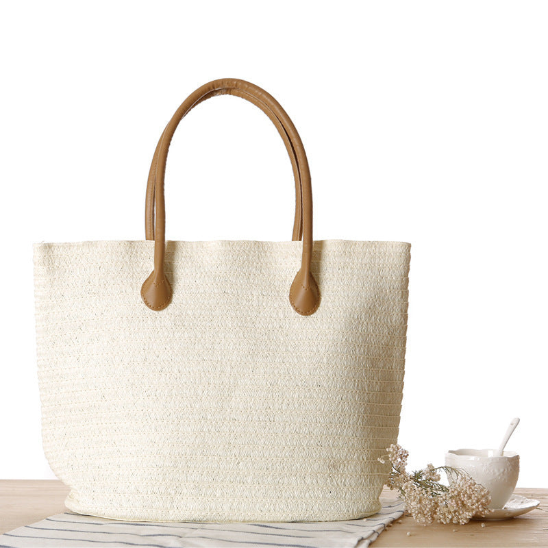 Spacious straw shopper with leather carrying handles Bowlift