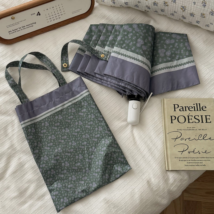 Women's eco-friendly shopping bag with integrated folding umbrella Bowlift
