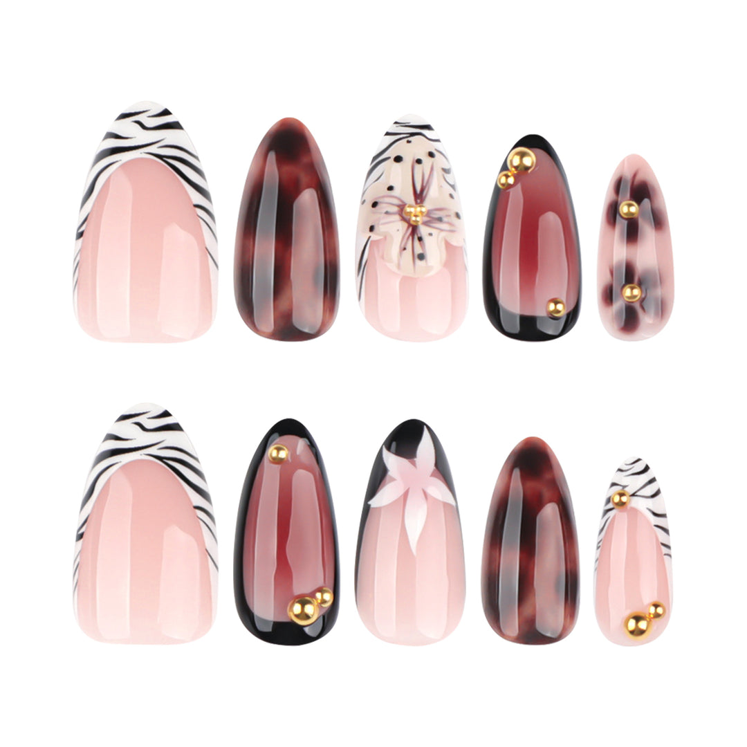 Nail Art with elegant flower design and glitter accents Bowlift