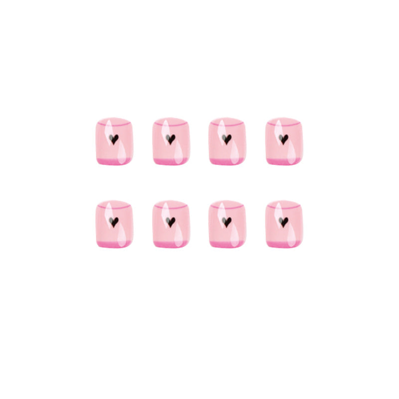 Creative Nail Art with Heart Design and Glitter Accents Bowlift