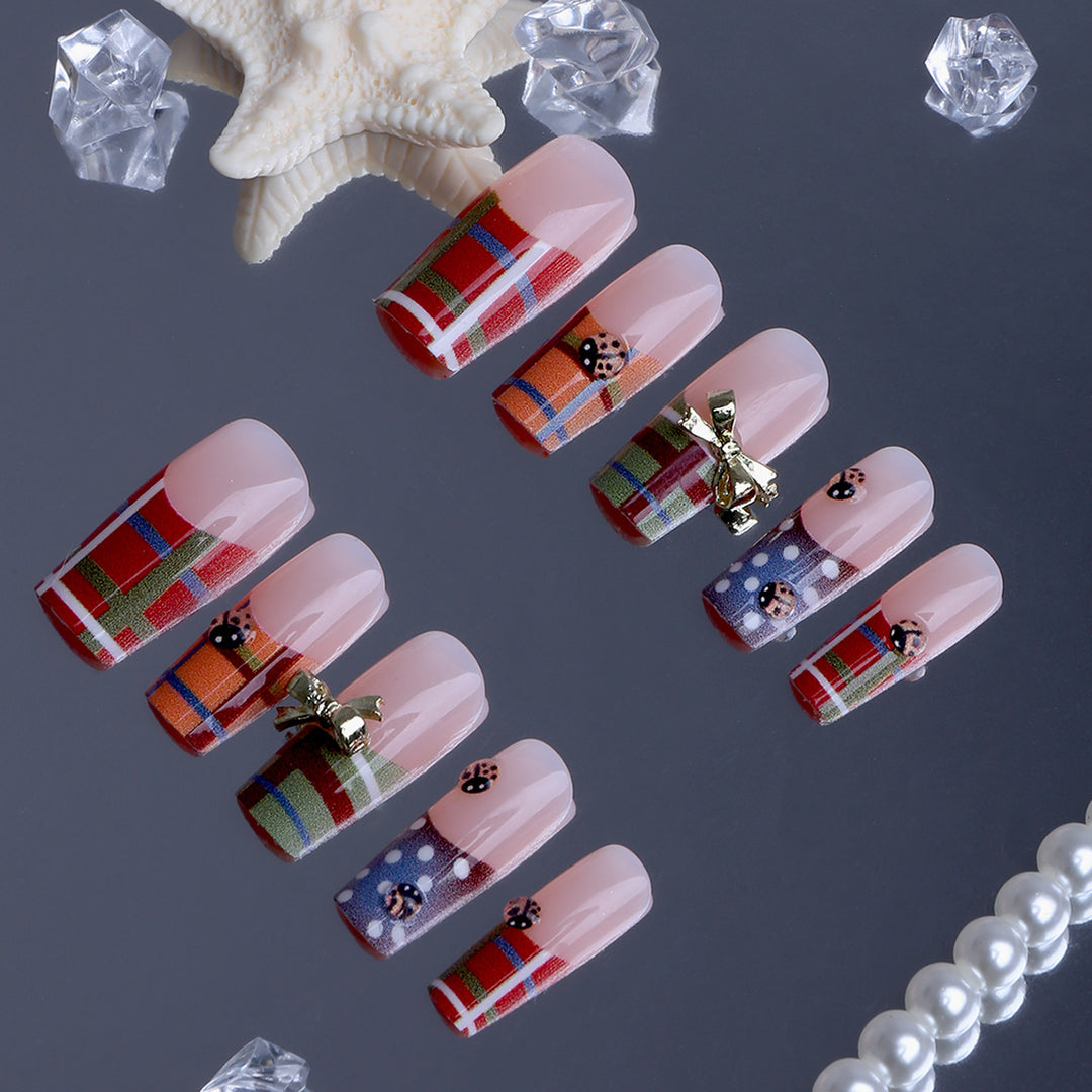 Artificial nails with unique plaid pattern and 3D applications Bowlift