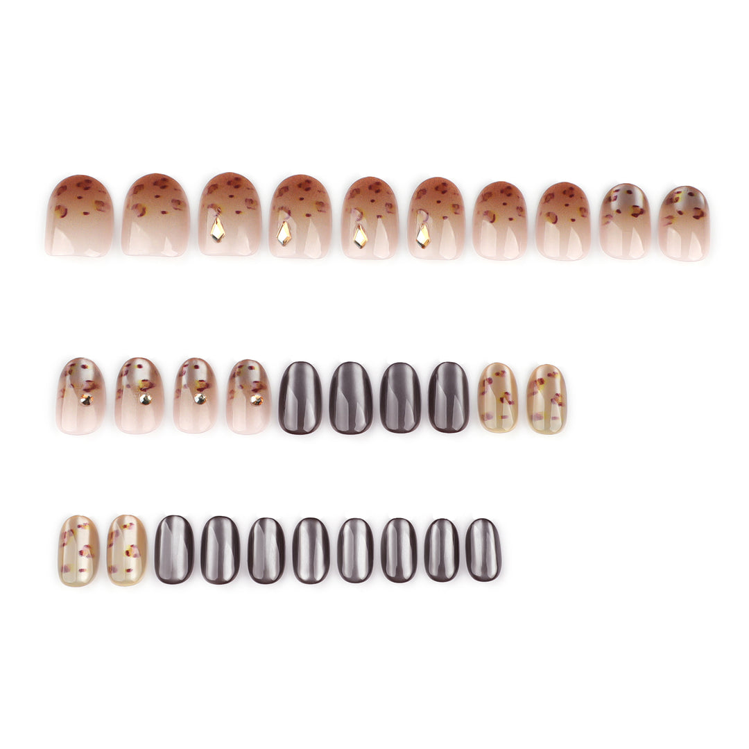 Artistic nail art with glitter accents and elegant design Bowlift