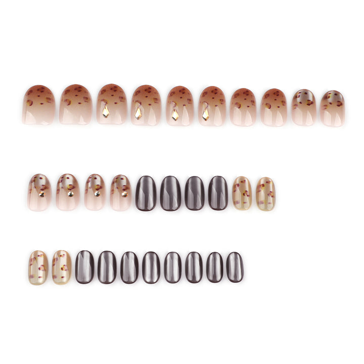 Artistic nail art with glitter accents and elegant design Bowlift