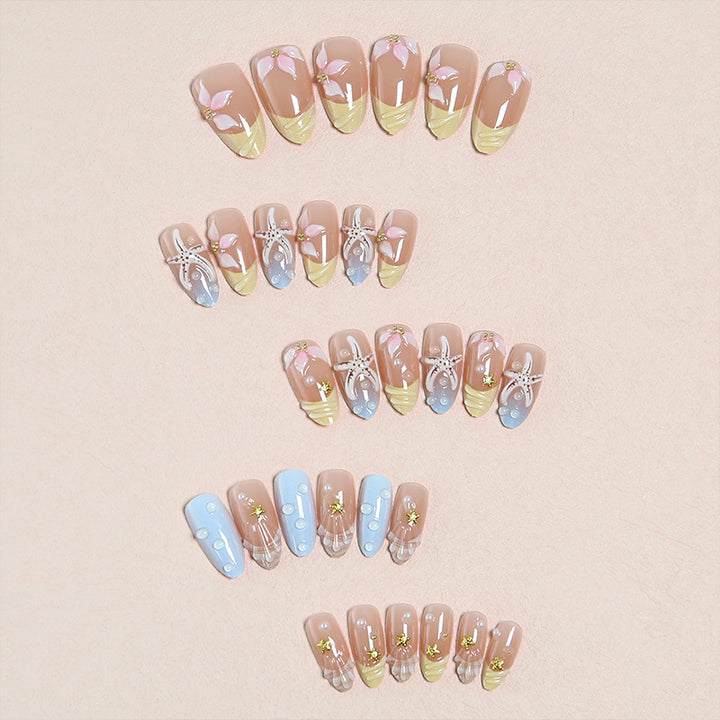 Artificial nails with floral motifs and glitter details Bowlift