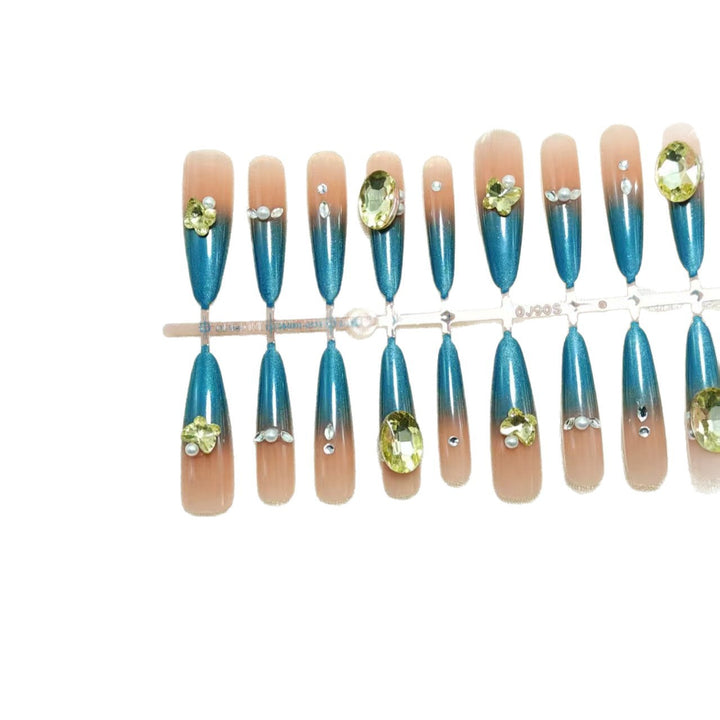 Artificial nails with glamorous stone applications Bowlift