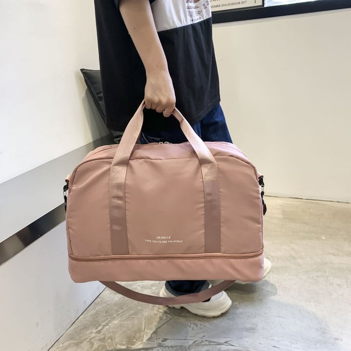 Sporty Travel Bag With Spacious Interior Compartment And Removable Shoulder Strap Bowlift
