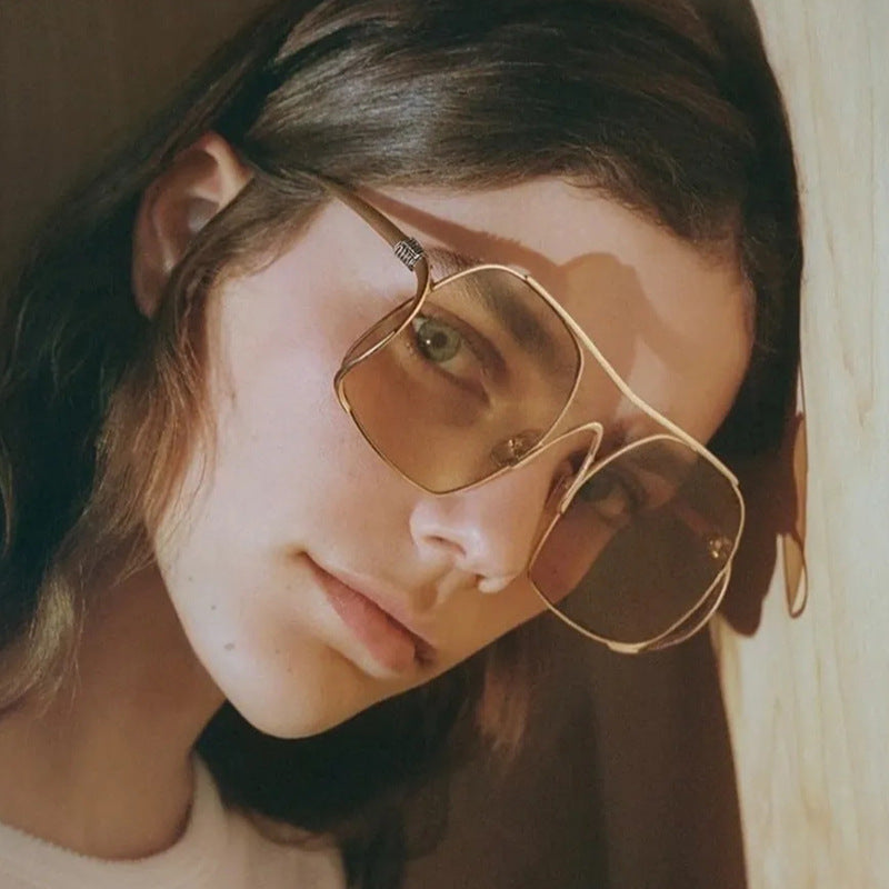 Women's geometric sunglasses with narrow metal frame and brown lenses Bowlift