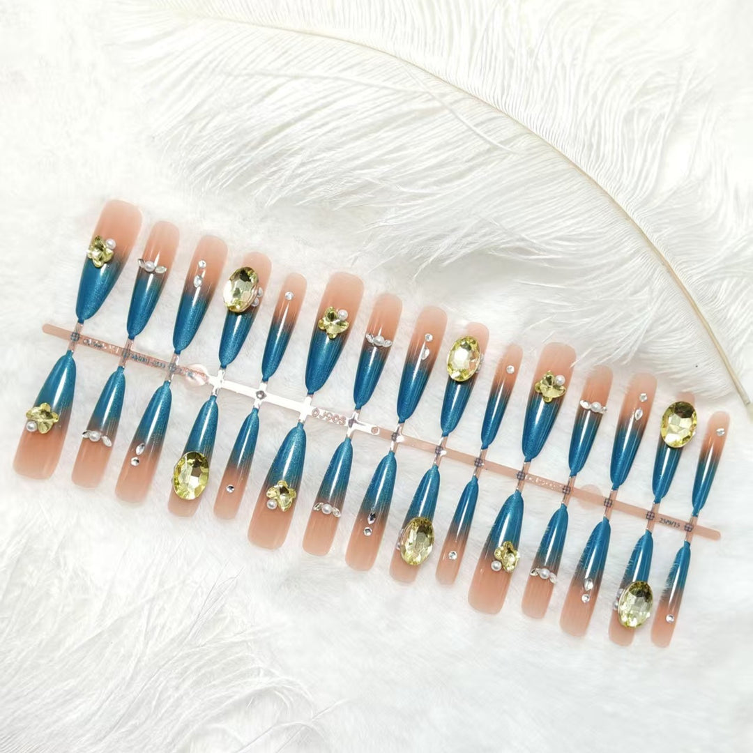 Artificial nails with glamorous stone applications Bowlift