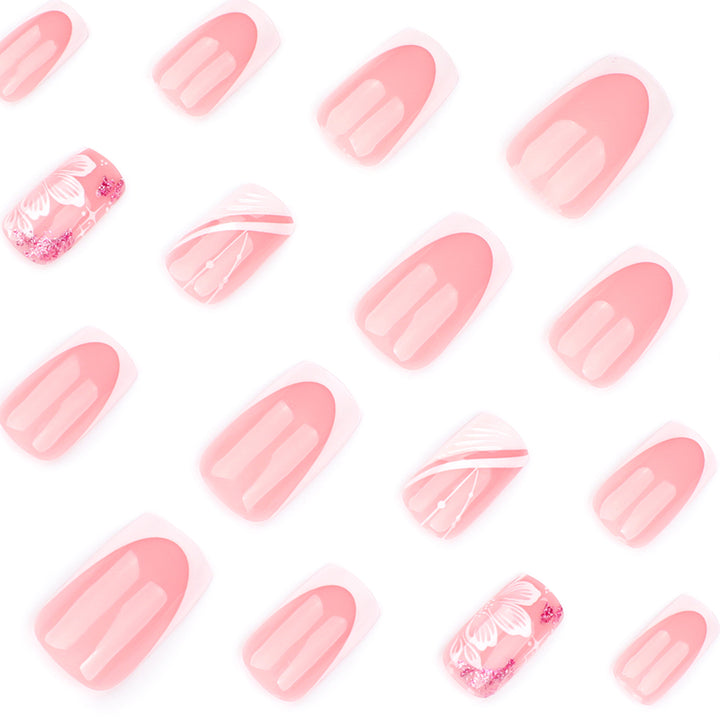 Artful Nail Art with Elegant French Tips and Floral Accents Bowlift