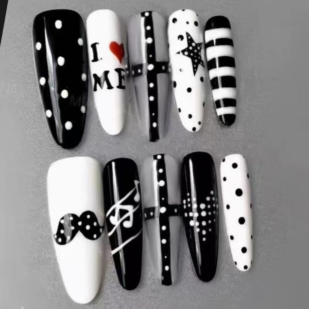 Artistic Long Stiletto Nail Enhancements Bowlift