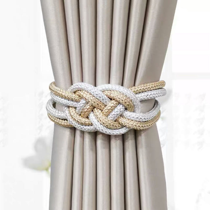 Decorative curtain tieback with braided design Bowlift