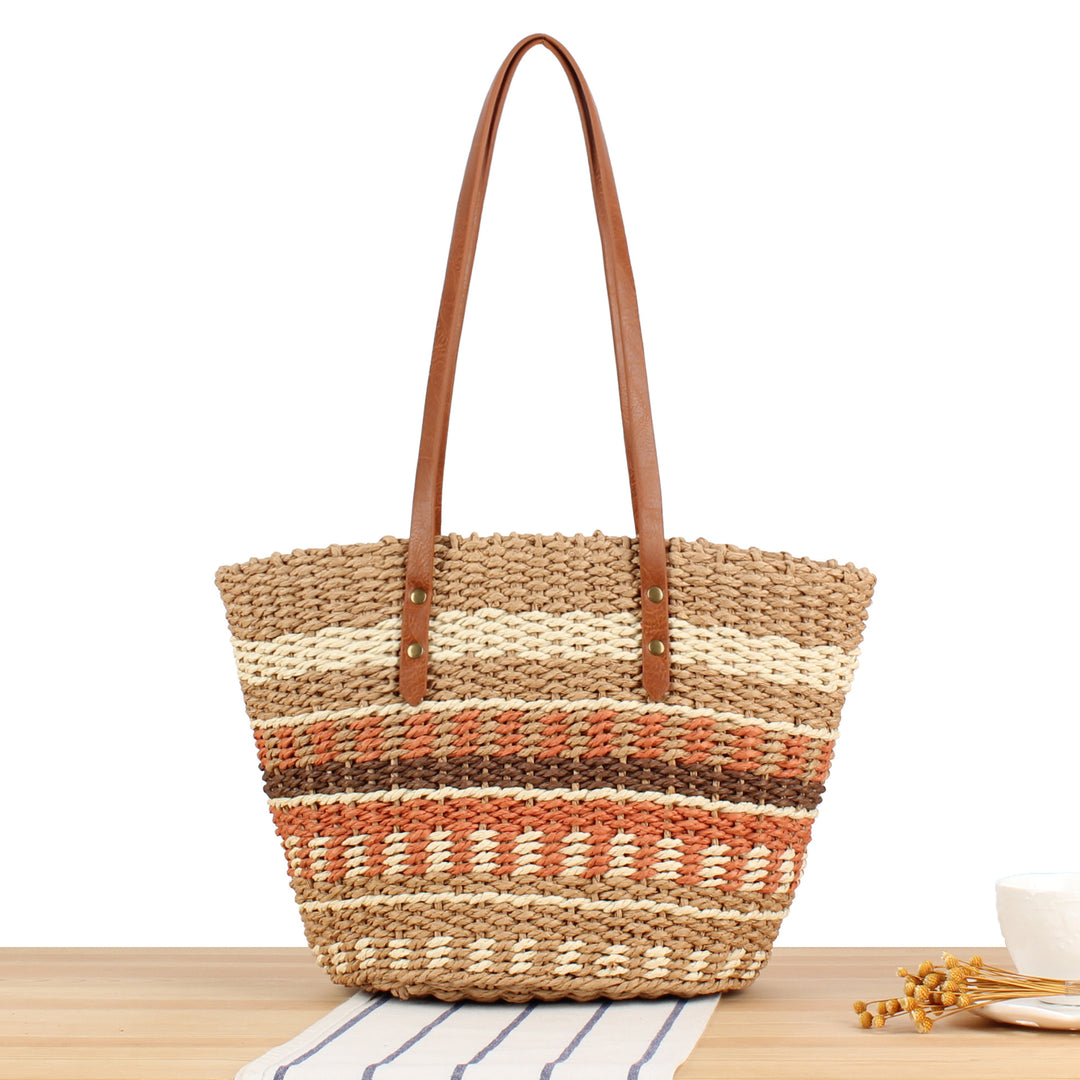 Tote bag made of braided natural material with elegant leather handles Bowlift