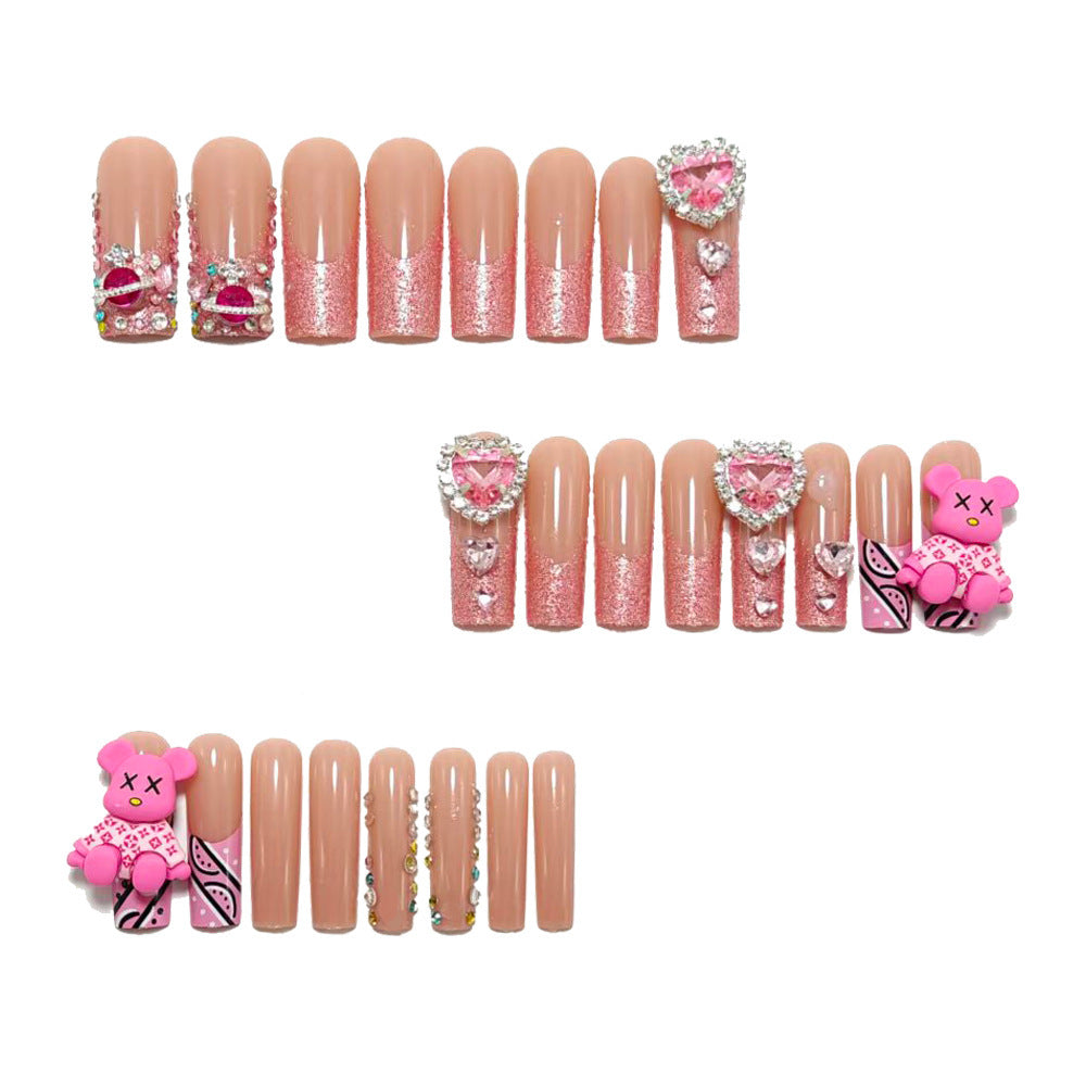 Artificial nail set with playful character motifs and glitter details Bowlift