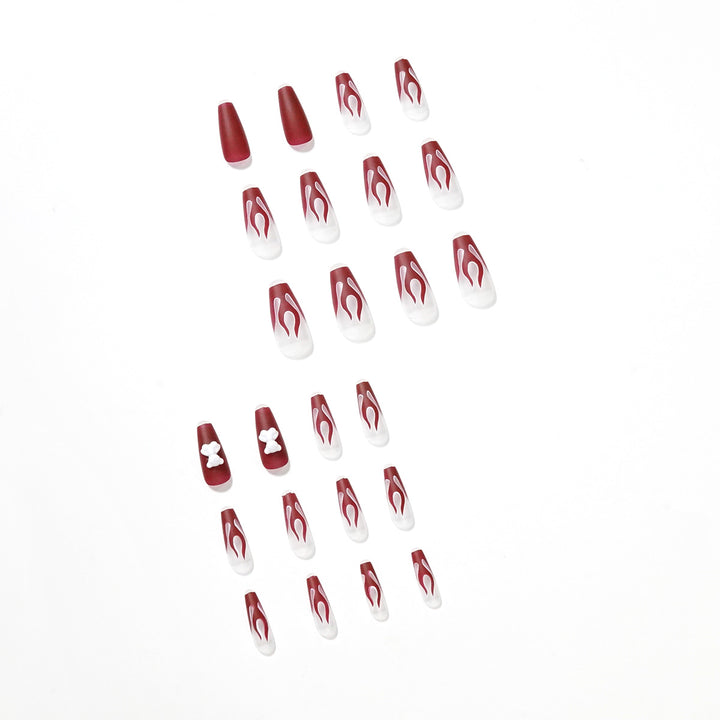 Artful stiletto nails with fiery flame design Bowlift