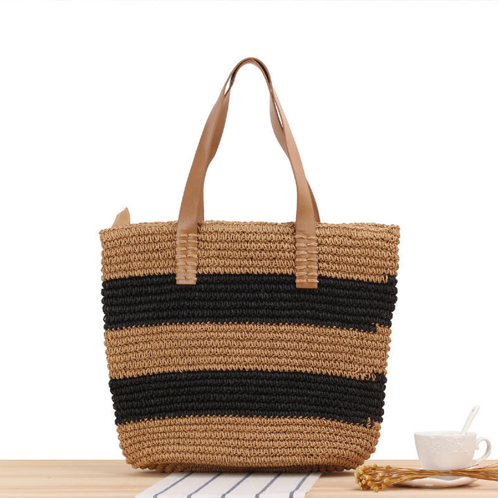 Spacious straw bag with elegant leather handles Bowlift