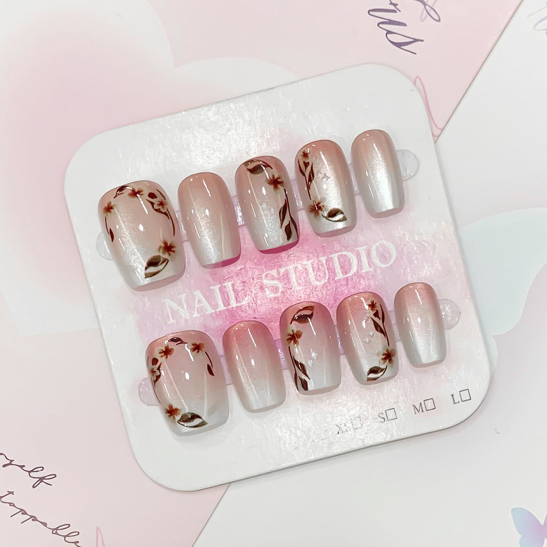 Artistic nail tips with floral accents Bowlift