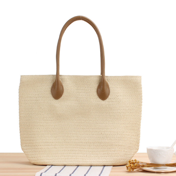 Spacious straw shopper with leather carrying handles Bowlift