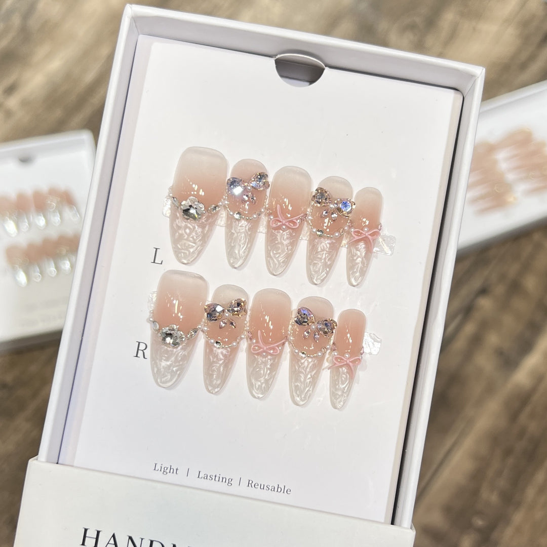 Decorative Stiletto Press-On Nail Set with Bow and Gem Accents Bowlift