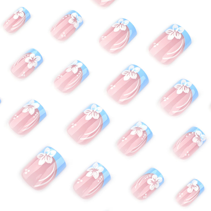 Artistic Nail Art with Floral Design and Elegant French Tip Finish Bowlift