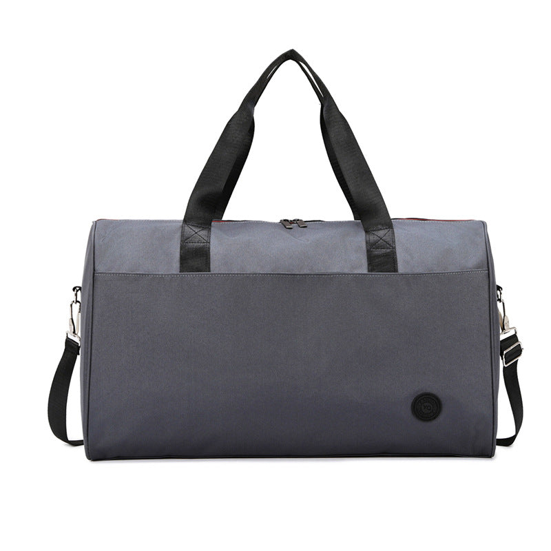 Sporty travel bag with sturdy carrying handles and removable shoulder strap Bowlift