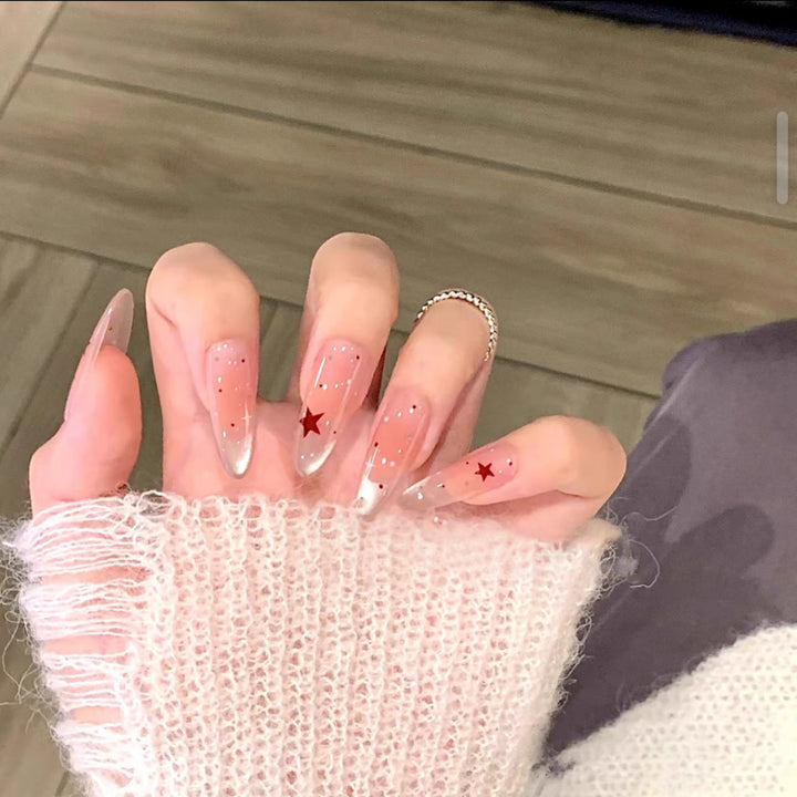 Long Stiletto Press-On Nails with Star Accent Bowlift
