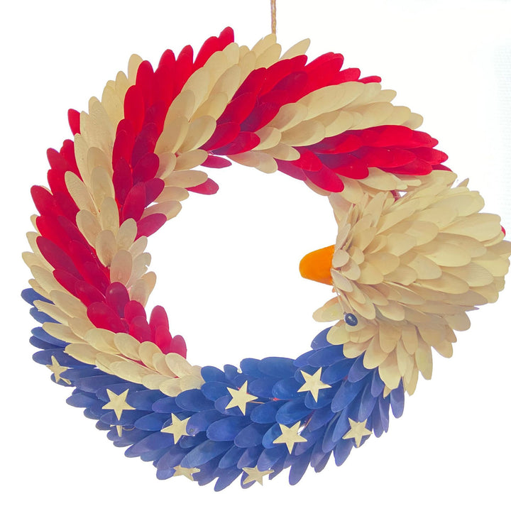 Unisex handmade decorative door wreath with eagle head and star appliqués made of wood Bowlift