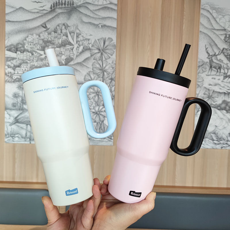 Women insulated drinking container with ergonomic handle Bowlift