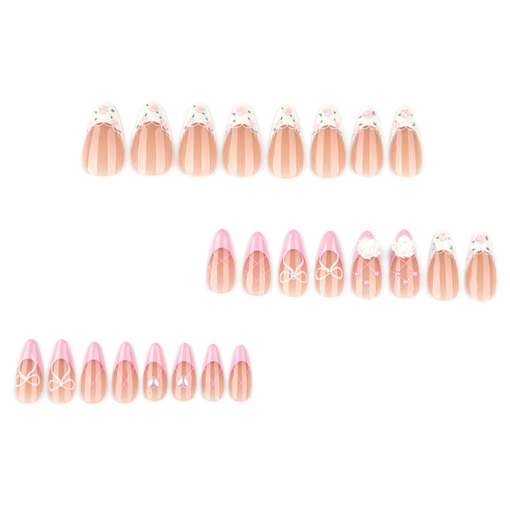 Artful nail art with floral details and bow embellishments Bowlift