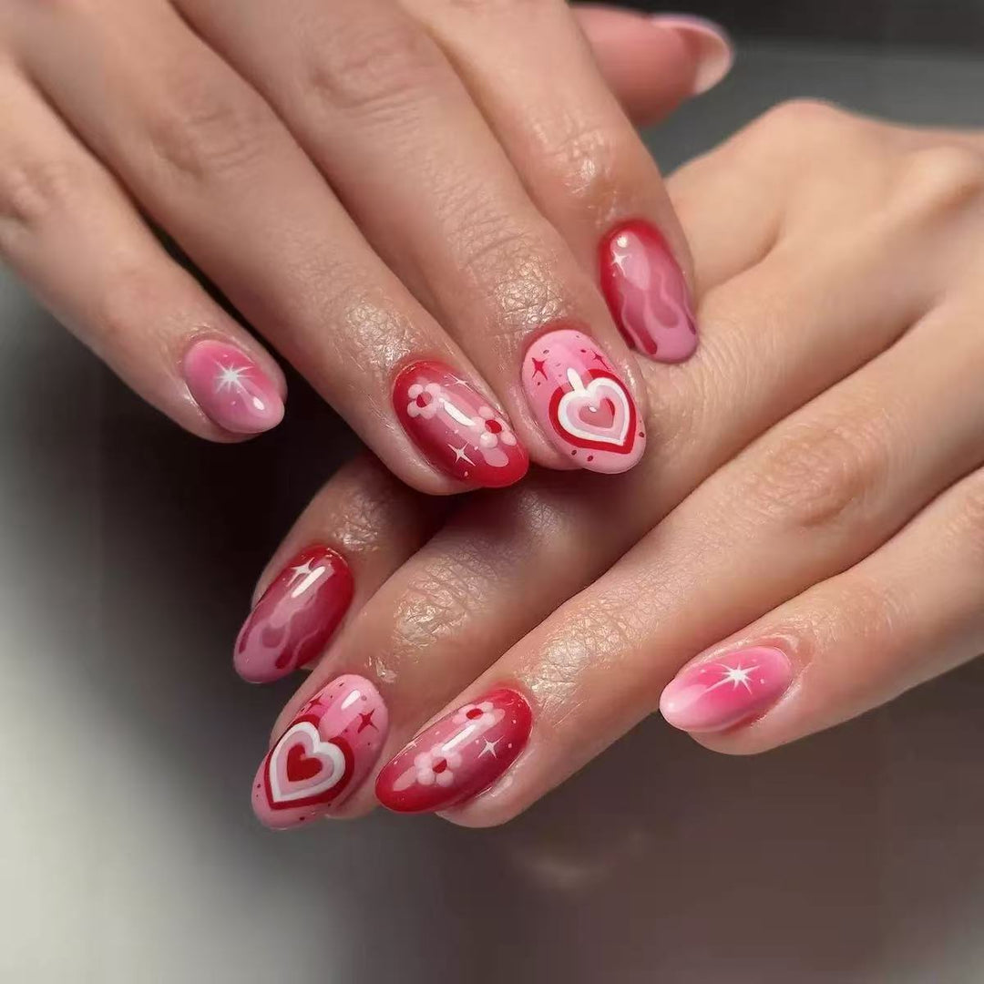 Artificial nail set with romantic heart design and sparkling accents Bowlift