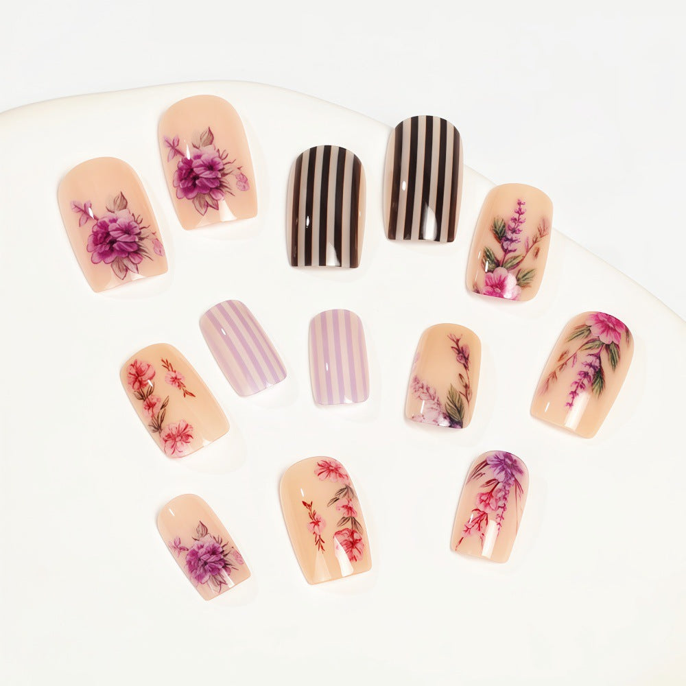 Artificial nails with floral and striped designs Bowlift