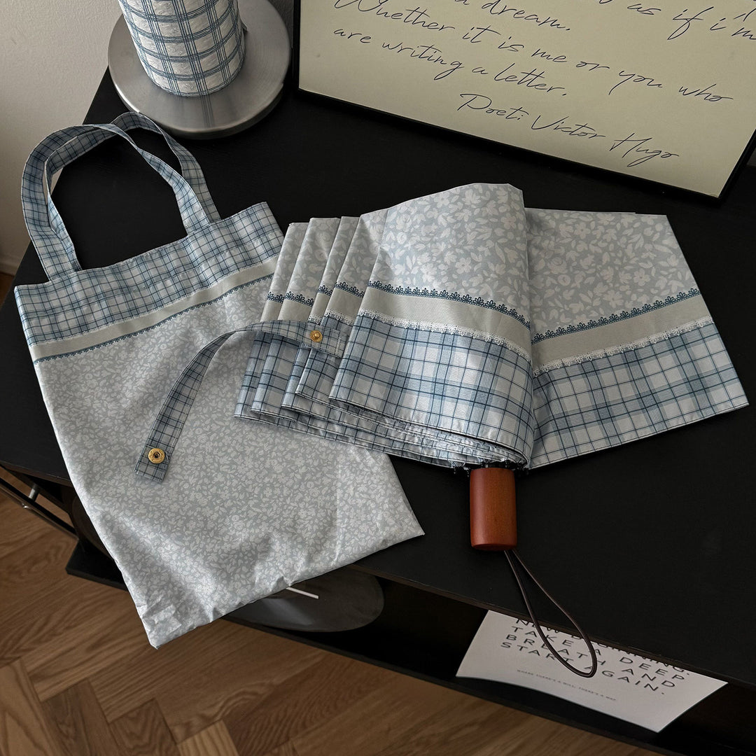 Women's tote bag with integrated folding umbrella Bowlift