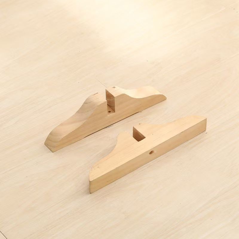 Wood shoe supports Bowlift