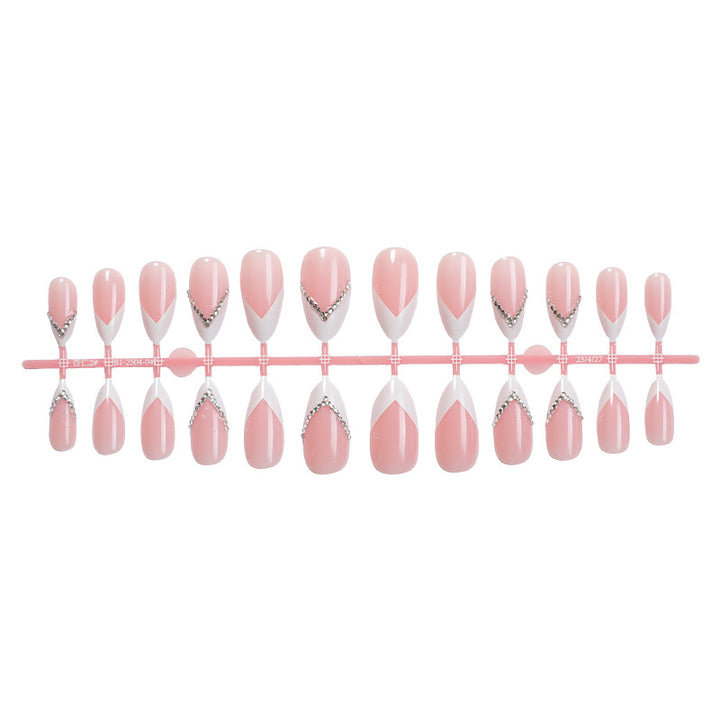 Elegant Pointed Press-On Nails with Rhinestone Accents Bowlift