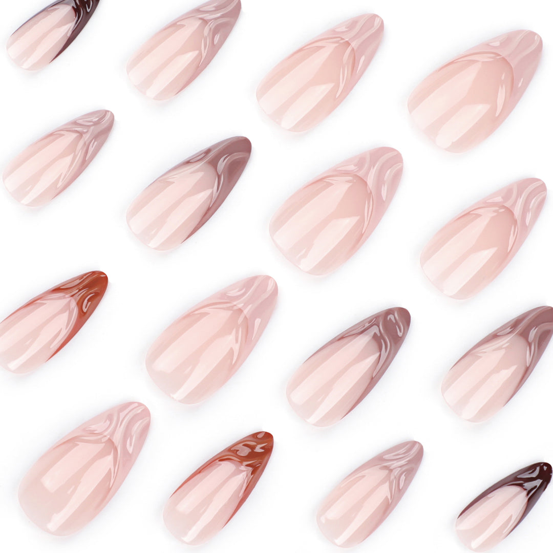 Artful stiletto nails with elegant gradient and glitter accents Bowlift