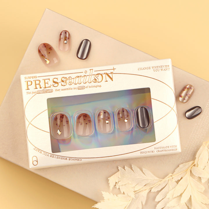 Artistic nail art with glitter accents and elegant design Bowlift