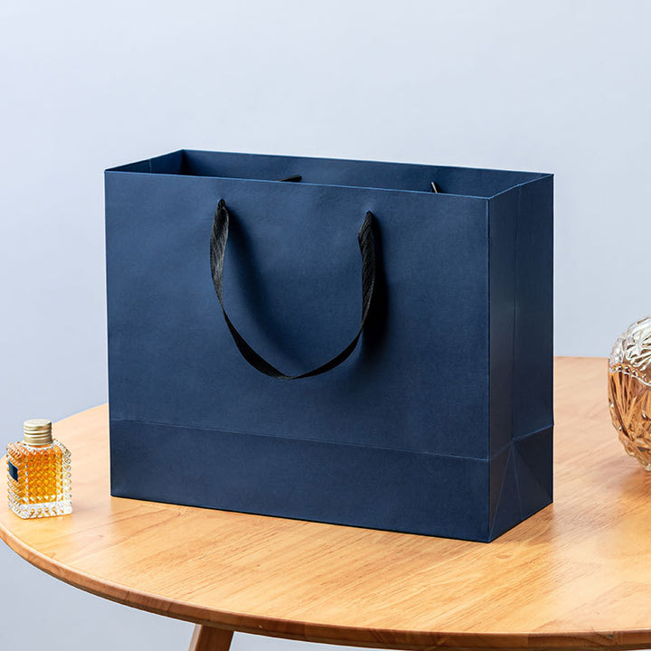 Premium Reusable Paper Gift Bag with Ribbon Handles and Reinforced Base Bowlift