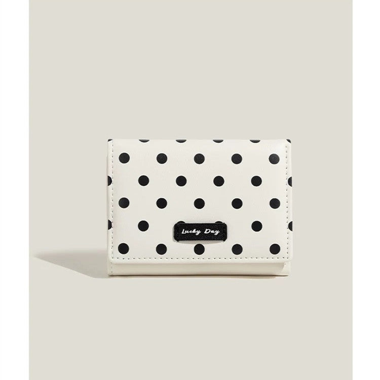 Compact polka dot trifold wallet with RFID protection multiple card and coin compartments Bowlift