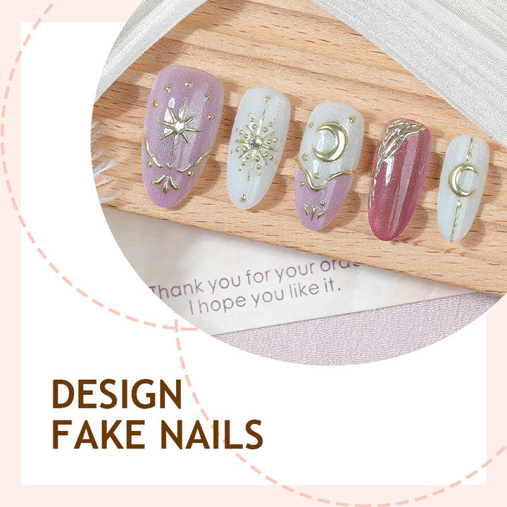 Artificial nail set with delicate gold embellishments and mystical motifs Bowlift